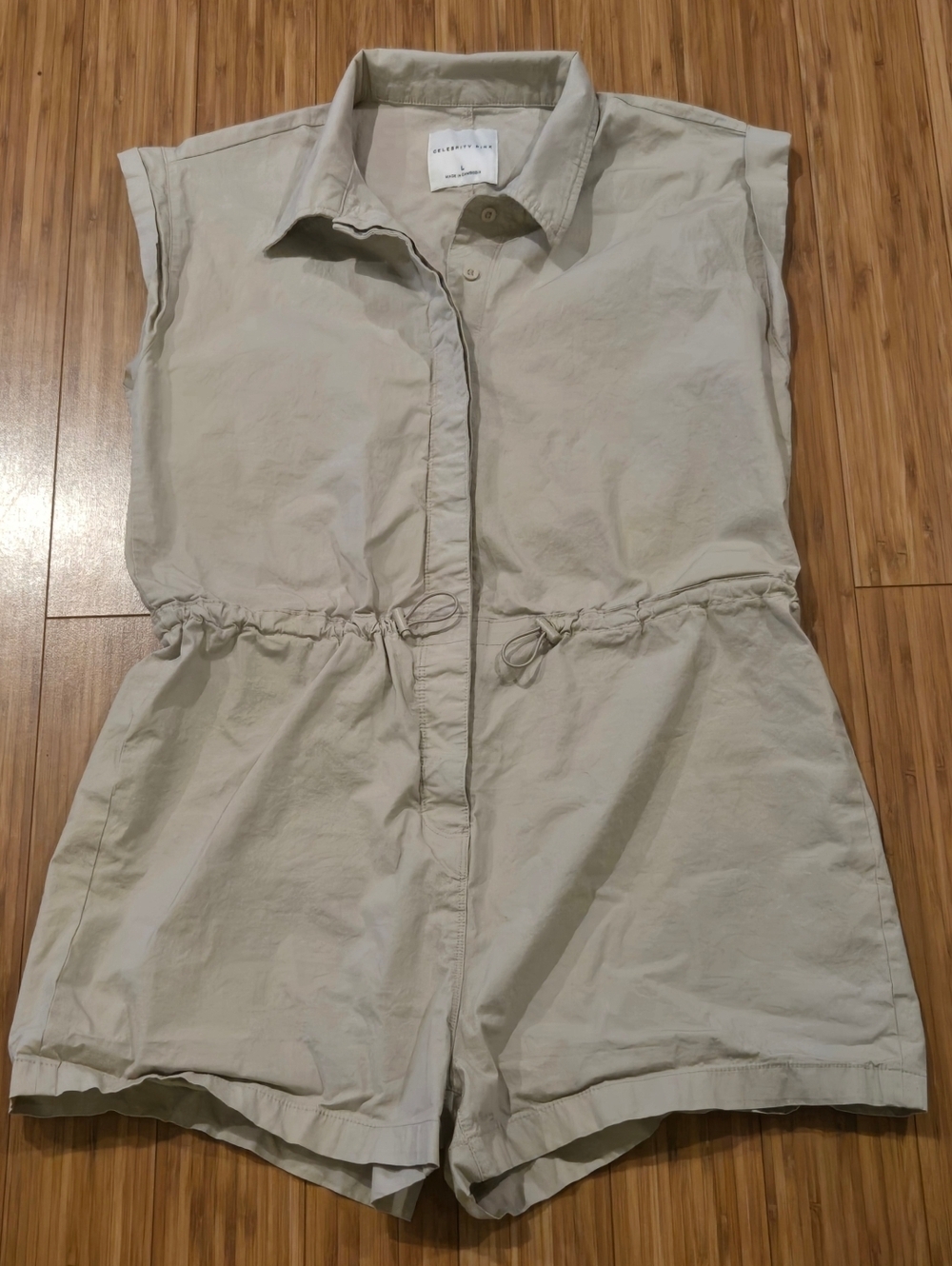 Celeberity Pink Sleeveless Drawstring Romper in Light Beige